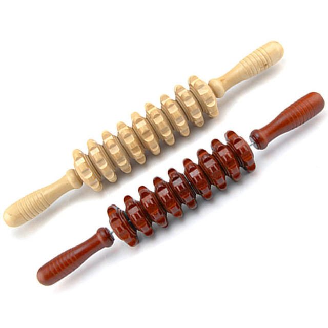 Wooden Muscle Recovery Roller Stick in use