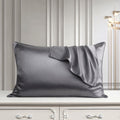 Metal grey mulberry silk pillowcase on a bed