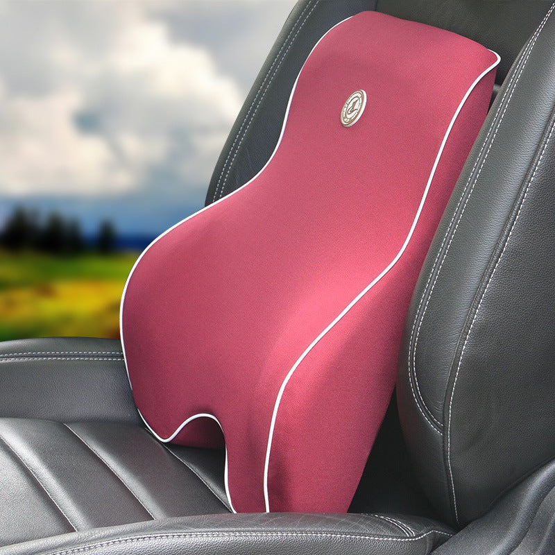 Lumbar cushion contoured shape