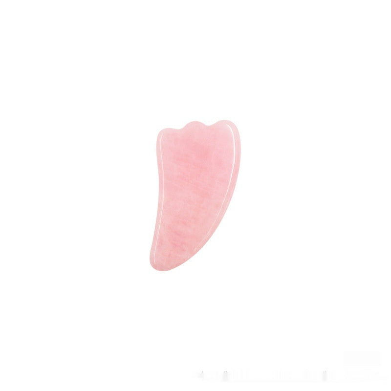Heart-shaped rose quartz gua sha stone